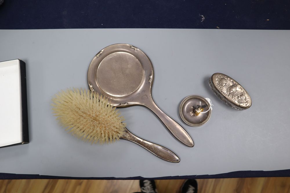A 22ct gold ring, (lacking stone), a silver handles mirror and brush, a silver ring tree and mounted glass toilet jar.
